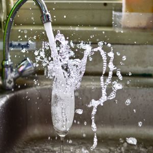 Close-up of water splashing on snow