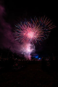 Firework display at night