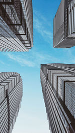 Low angle view of modern buildings against sky