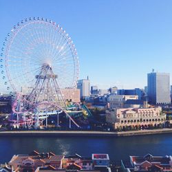 Ferris wheel against blue sky