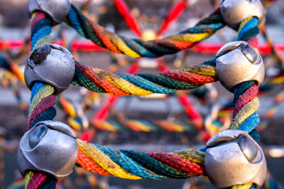 Close-up of colorful rope equipment at playground