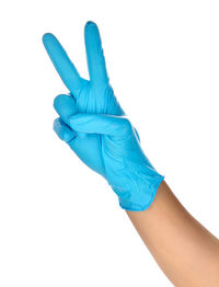 Close-up of human hand against white background