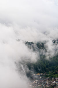 Scenic view of fog against sky