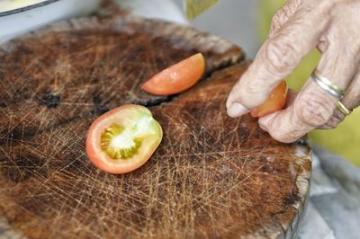 Close-up of hand holding fruit