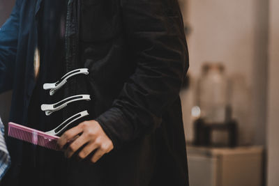 Side view of man holding text