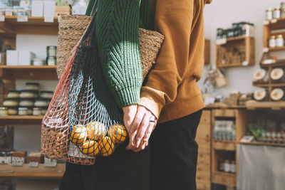 Couple holding hands in sustainable shop