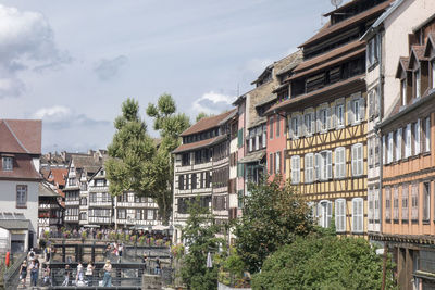 Residential buildings against sky in city