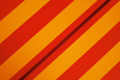 Full frame shot of striped red and yellow canvas