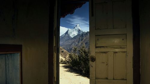 Scenic view of snowcapped mountains against sky during winter