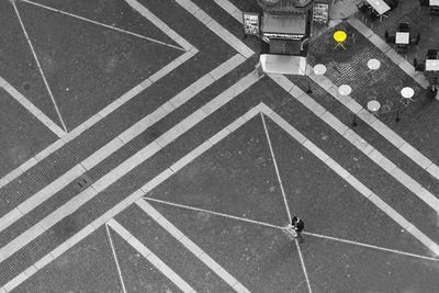 High angle view of people crossing road