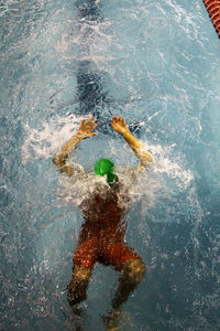 High angle view of athlete swimming in pool