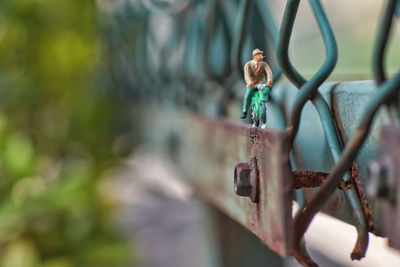 Close-up of padlock on railing