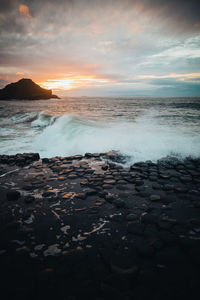 Scenic view of sea against sky during sunset