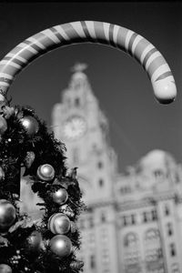 Low angle view of christmas tree against sky