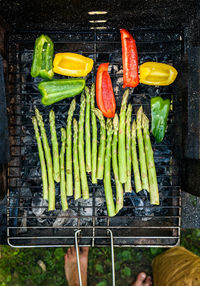 Directly above shot of vegetables on barbecue grill