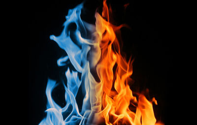 Close-up of fire against black background