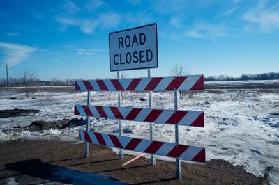 Warning sign on snow