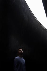 Young man standing outdoors