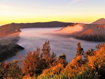 Scenic view of mountain against sky during sunset