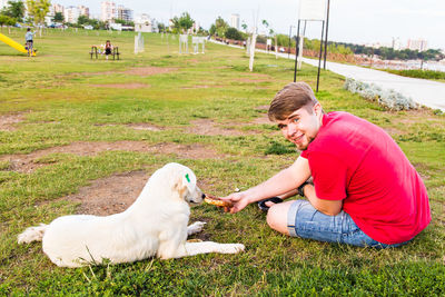 Side view of dog on grass