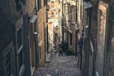 Alley amidst buildings in town