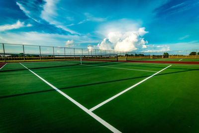 Empty road against sky