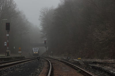 Railroad tracks in foggy weather