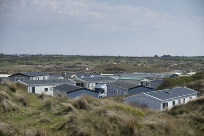 High angle view of buildings against sky