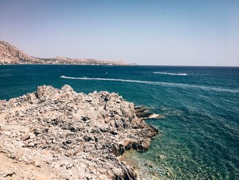 Scenic view of sea against clear sky