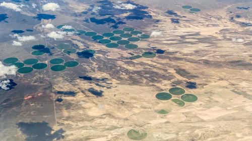 High angle view of balloons on land against sky