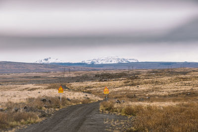 Road amidst landscape against sky