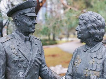 A monument to an old man, an officer and a nurse, to the participants in the hostilities