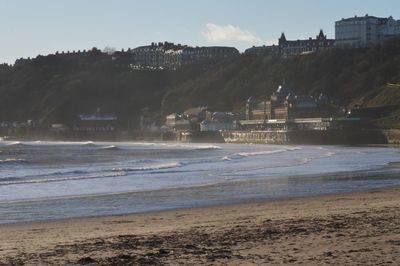 View of calm beach against sky