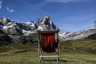 View of landscape against mountain range