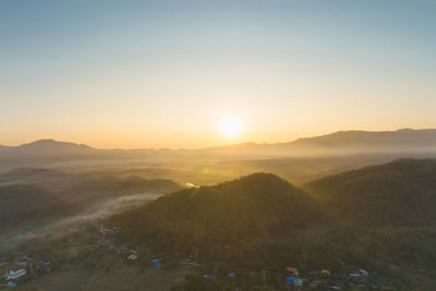 High angle view of townscape against sky during sunset