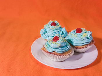 High angle view of cupcakes on table