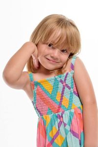 Portrait of cute girl wearing white background