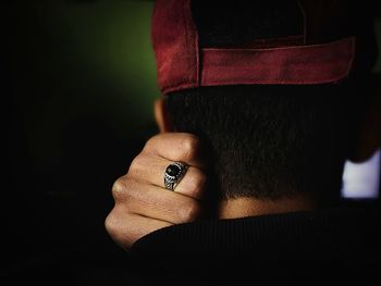 Close-up of man wearing ring