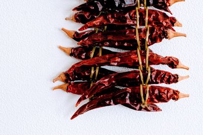 High angle view of red chili peppers on table