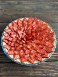 High angle view of strawberry tart on table
