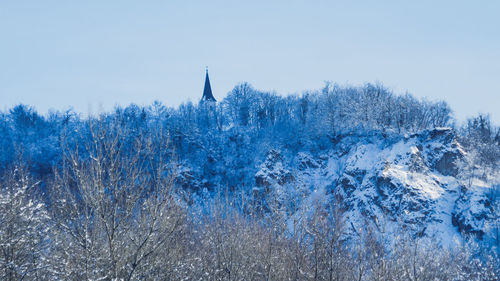 Snow on mountain against sky