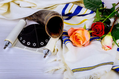 High angle view of white rose on table