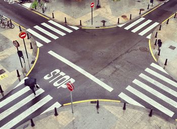 High angle view of people crossing road