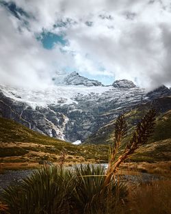 Scenic view of snowcapped mountains against sky