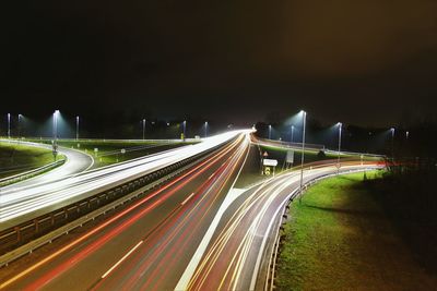 Light trails on road at night