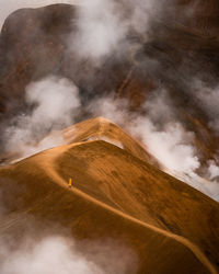 Aerial view of mountain against sky