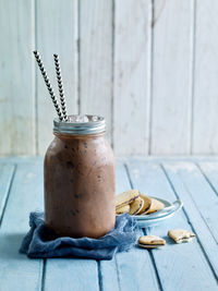 Close-up of drink in jar on table