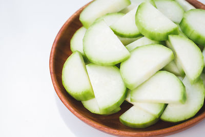 High angle view of chopped vegetables in bowl on table
