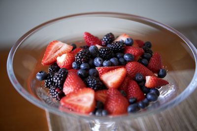 High angle view of strawberries in bowl on table