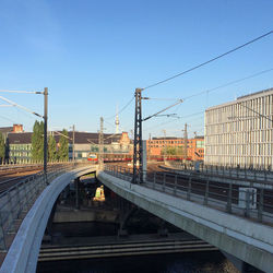 Railroad tracks against blue sky